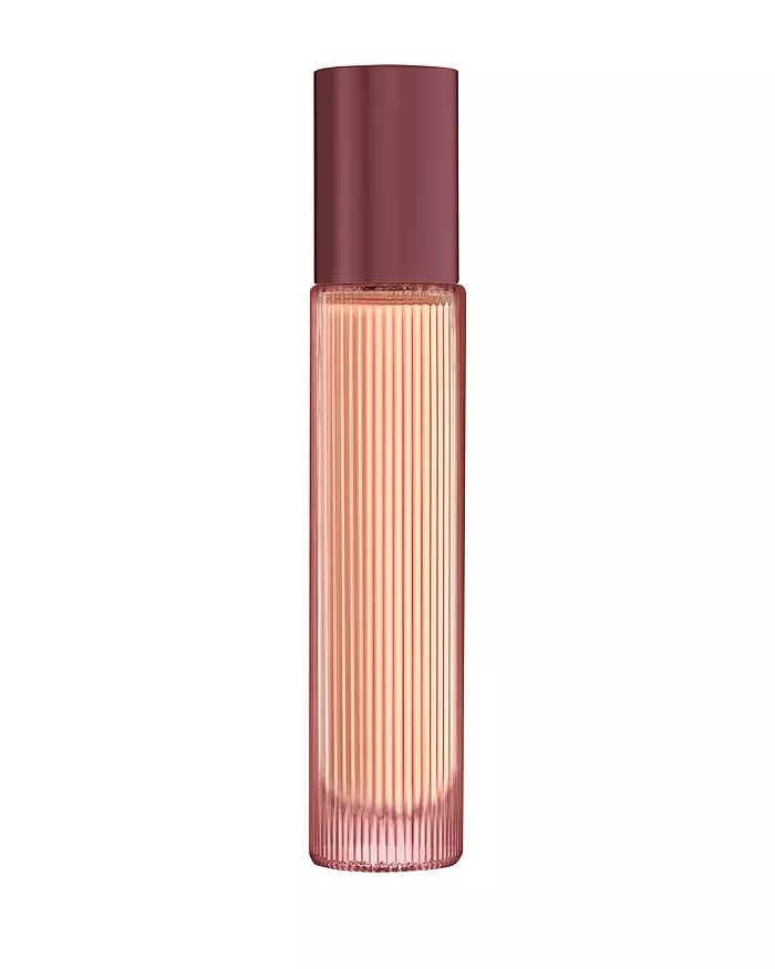 Tom Ford Cafe Rose EDP bottle in rosey pink glass, ideal for evening wear.