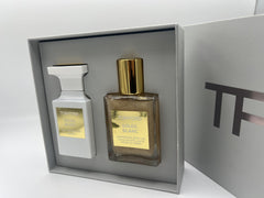 Tom Ford Soleil Blanc shimmering body oil bottle for radiant skin.