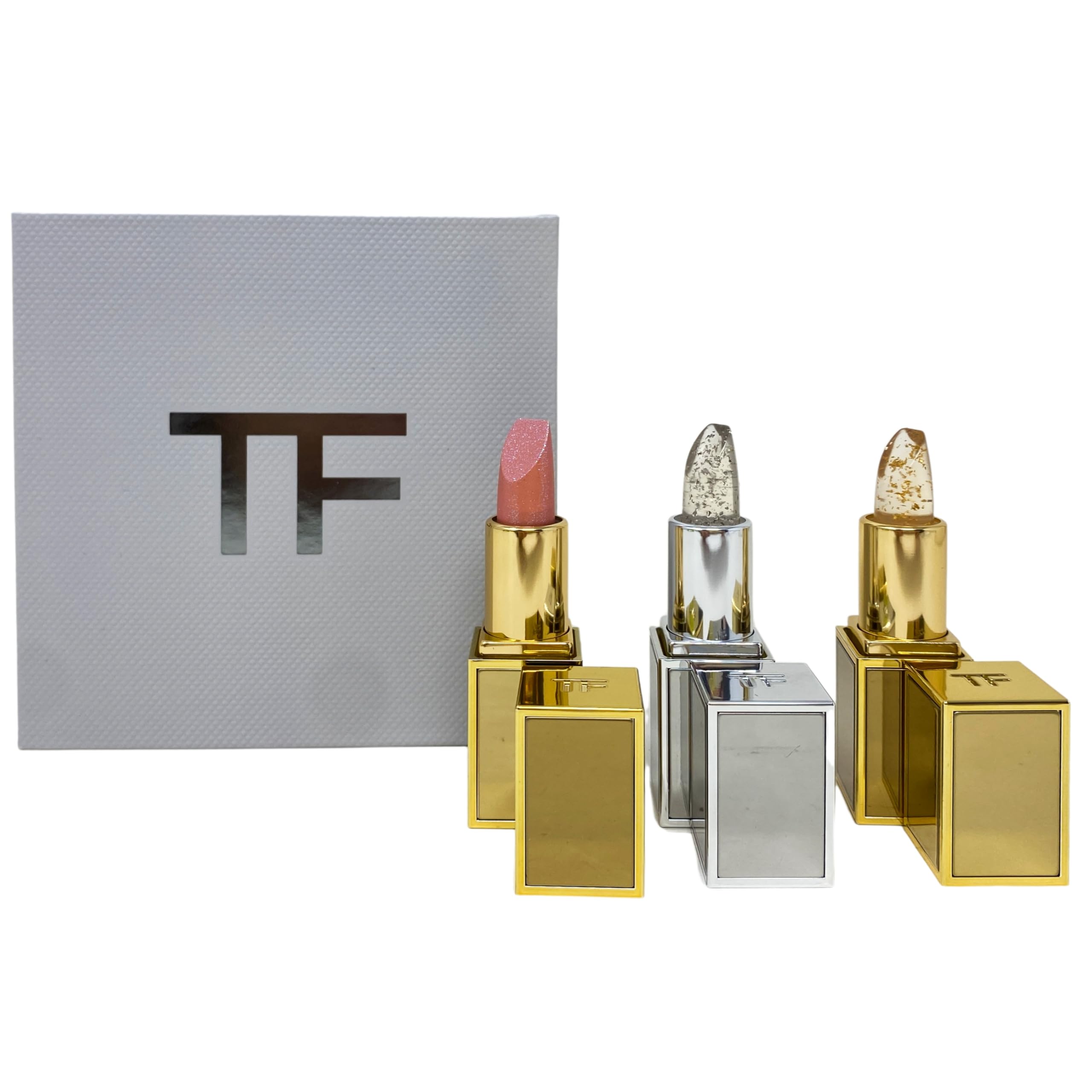 Tom Ford Soleil Clutch Lip Set Sunlit Rose balm adds a subtle pink glow for everyday wear.