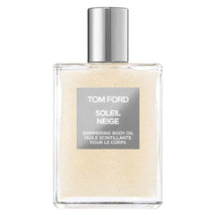 Tom Ford Soleil Neige shimmering oil close-up delivering light-reflecting glow and smooth hydration.