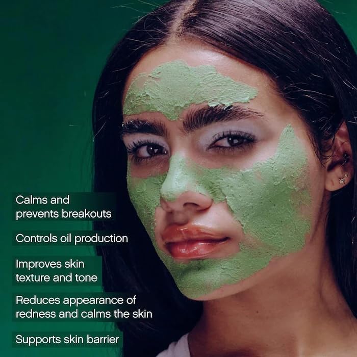 Topicals Clearly Breakout Mask being spread on skin for even coverage during treatment.
