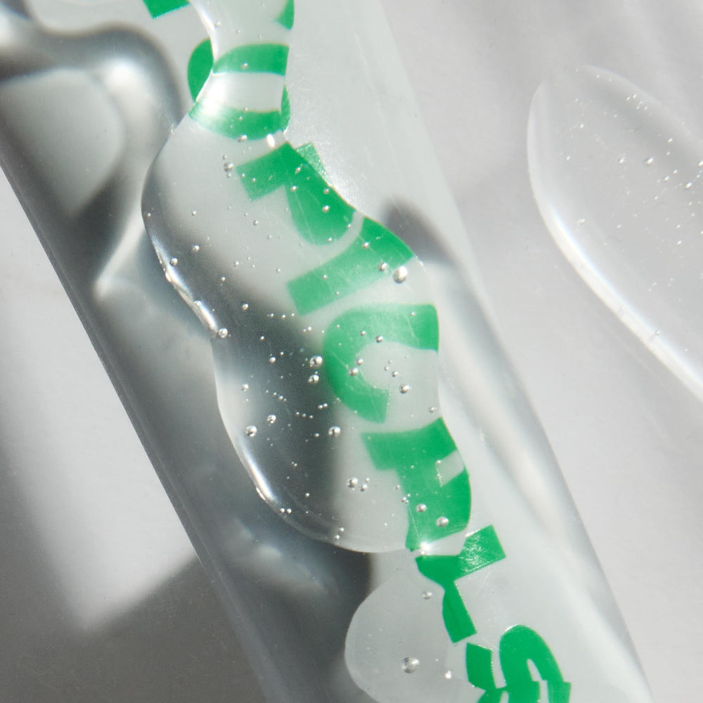 Topicals Slick Salve Mint Glossy Lip Balm ingredients include shea and coconut oil