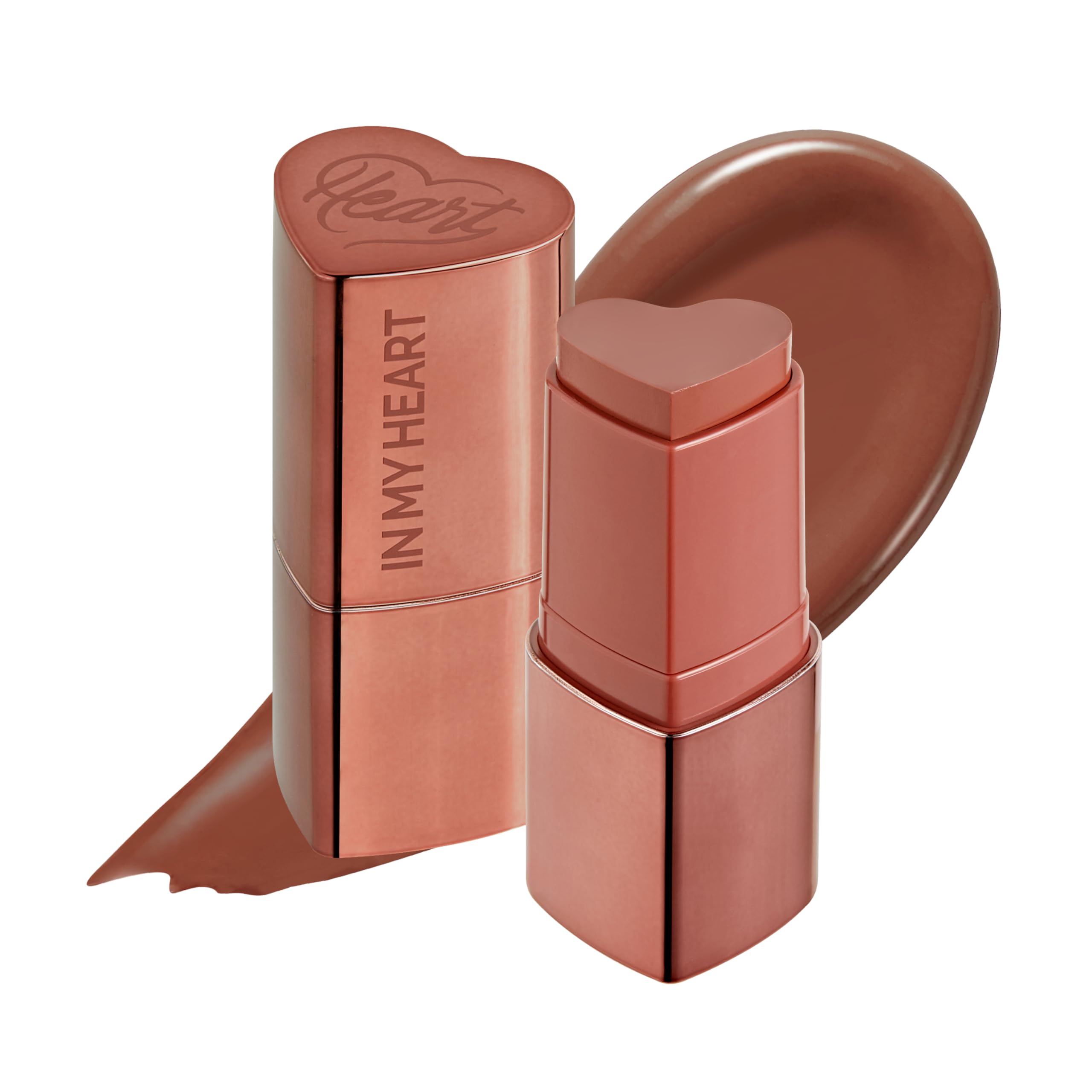 Touch in Sol In My Heart Stick Blush swatch on cheek for dewy color