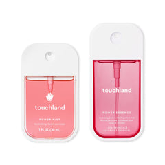 Touchland JUICY ESCAPE bottle pour showcases travel-friendly design.