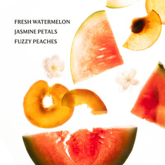 Touchland Lush Tropicale fragrance mist closeup with tropical notes.