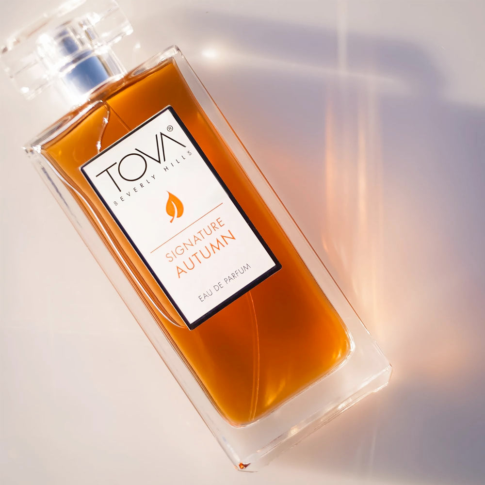 Tova Signature Autumn amber hue closeup, hints of vanilla orchid and sandalwood.