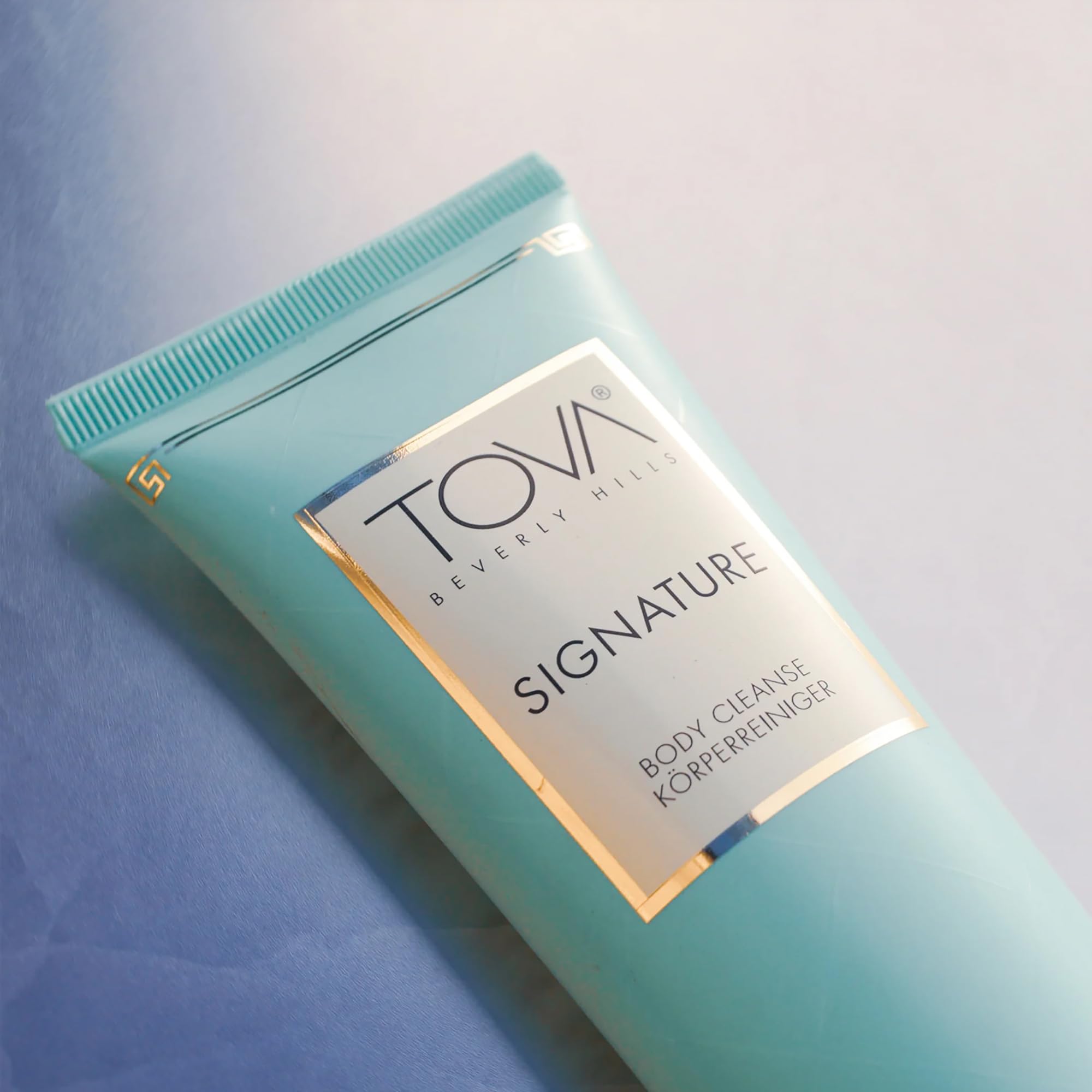 TOVA Signature bubbles lather close-up suggests luxurious hydration during showers.