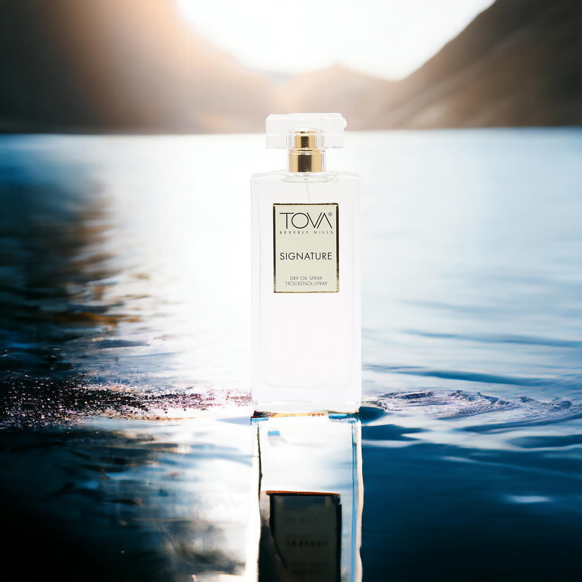 Tova Signature dry oil spray application: lightweight mist for quick daily moisture.
