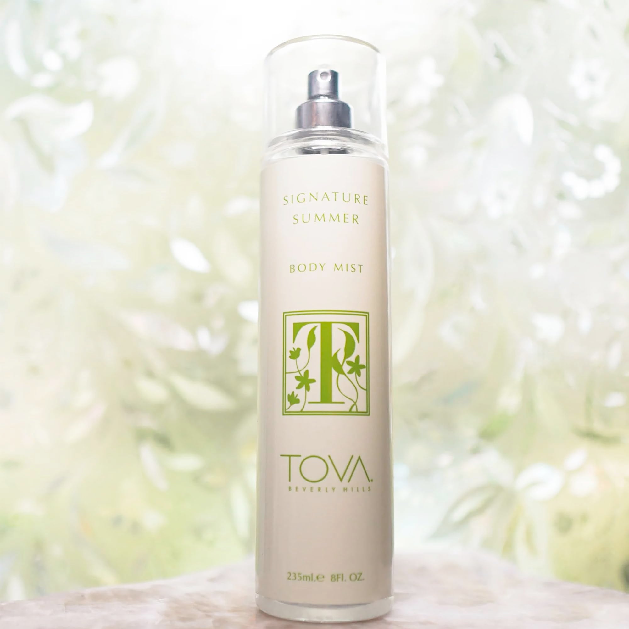 Tova Signature Summer label closeup highlighting layered notes and amethyst accents.