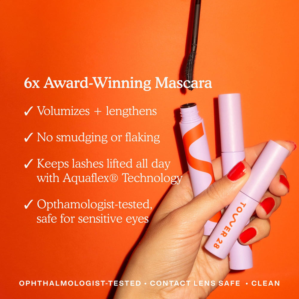 Tower 28 Mascara wand angled in use to lift lashes.