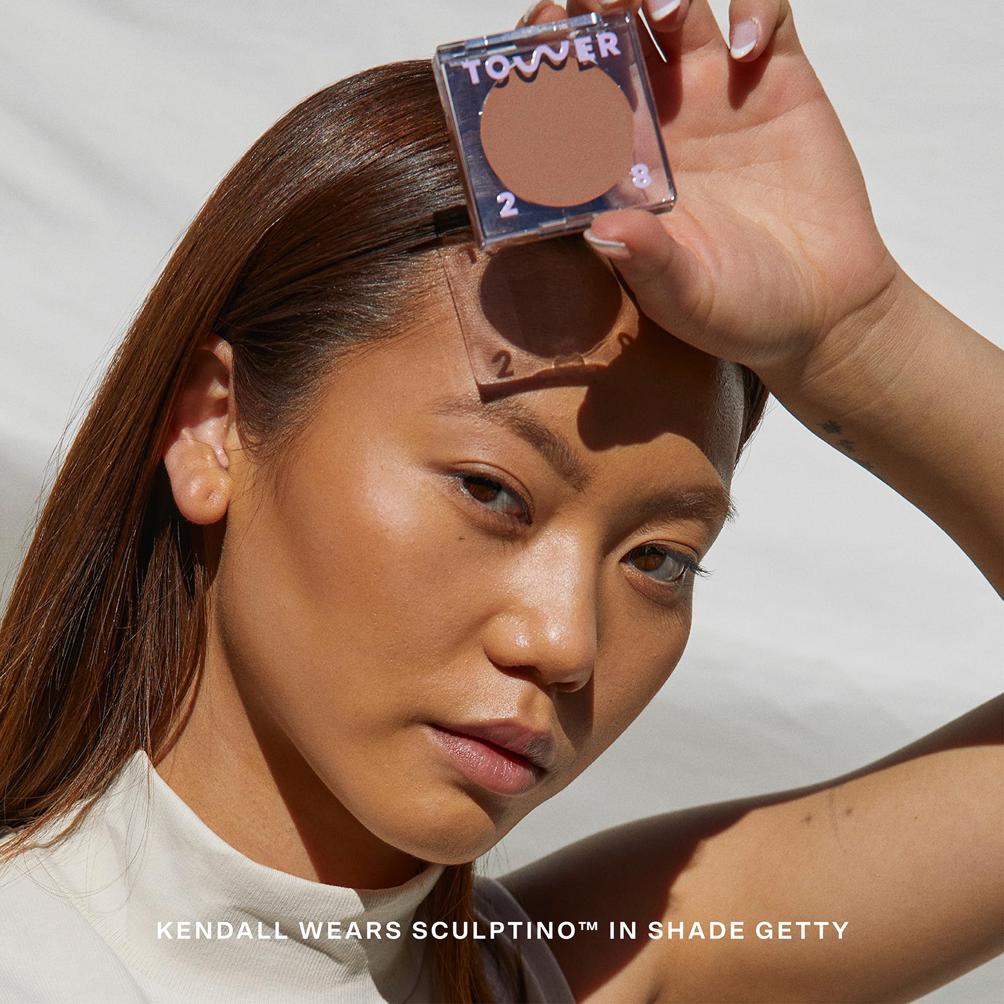 Tower 28 Sculptino creamy bronzer offers a soft matte finish on skin.