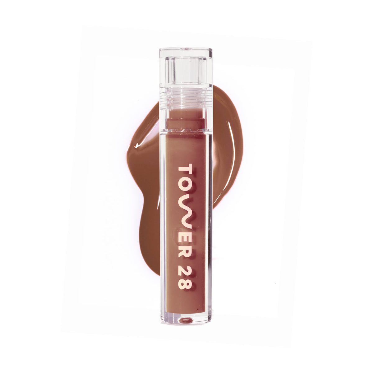 Tower 28 ShineOn Milky Lip Jelly Almond swatch reveals creamy color and smooth hydration.