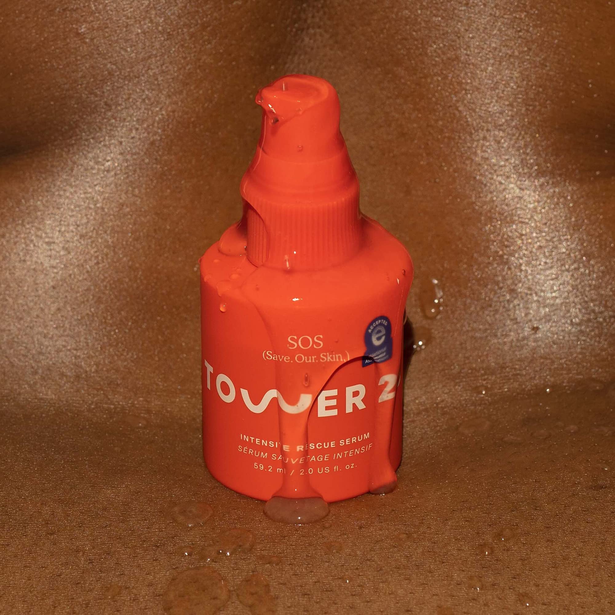 Tower 28 SOS Rescue Face Serum packaging image hints eco-conscious design.