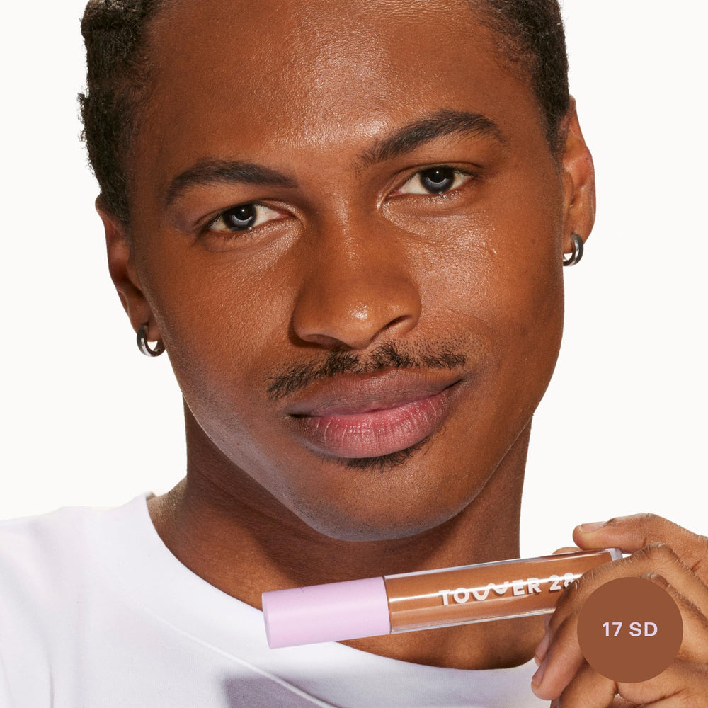 Tower 28 Swipe Serum Concealer in motion for easy blending on skin