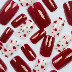 Toypoels nails glossy red finish for salon-like shine at home.