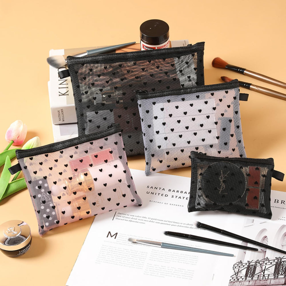 TRAKWAN zippered heart mesh purse in pink keeps essentials secure on the go