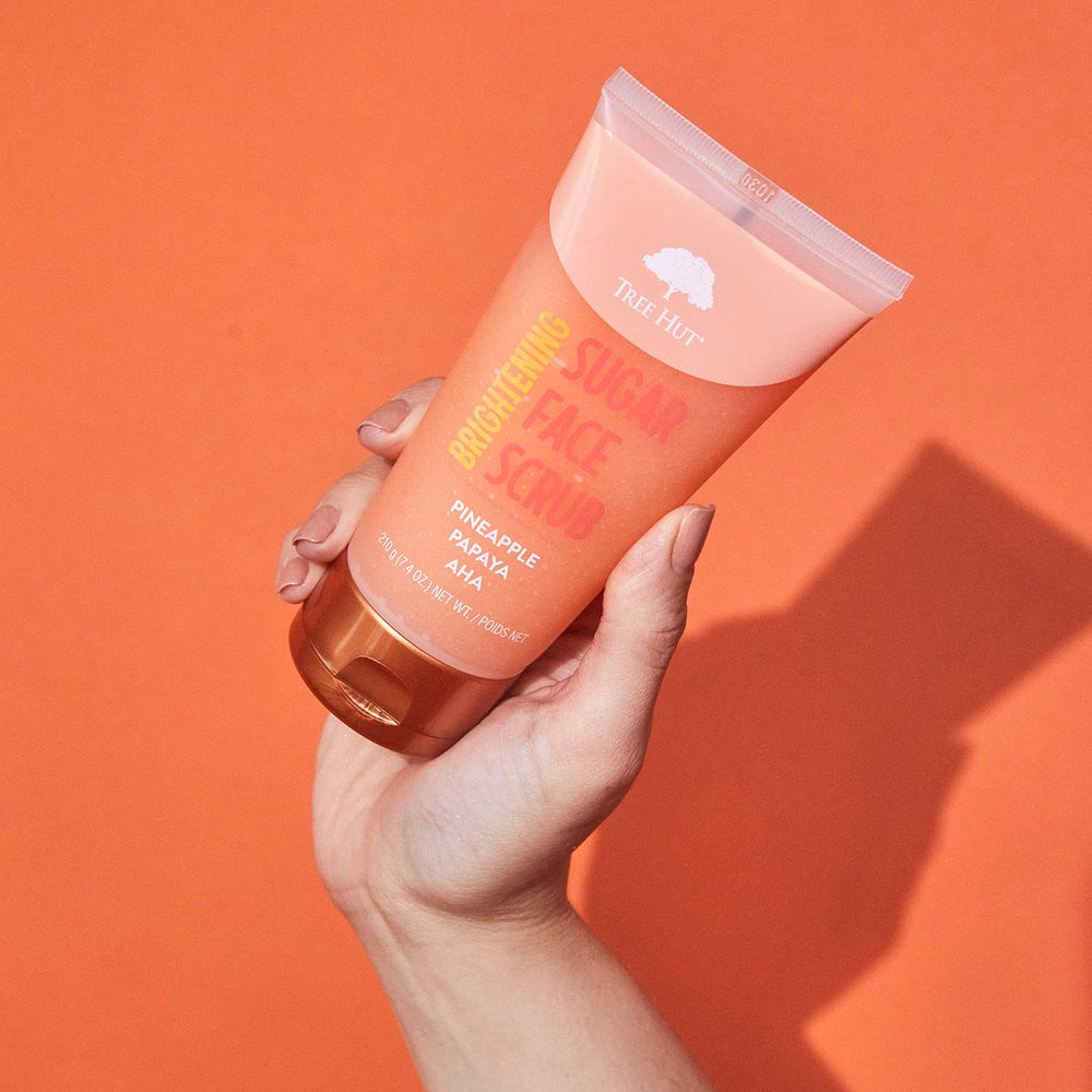 Ingredients list of Tree Hut Pineapple Papaya Scrub focusing on natural exfoliants.