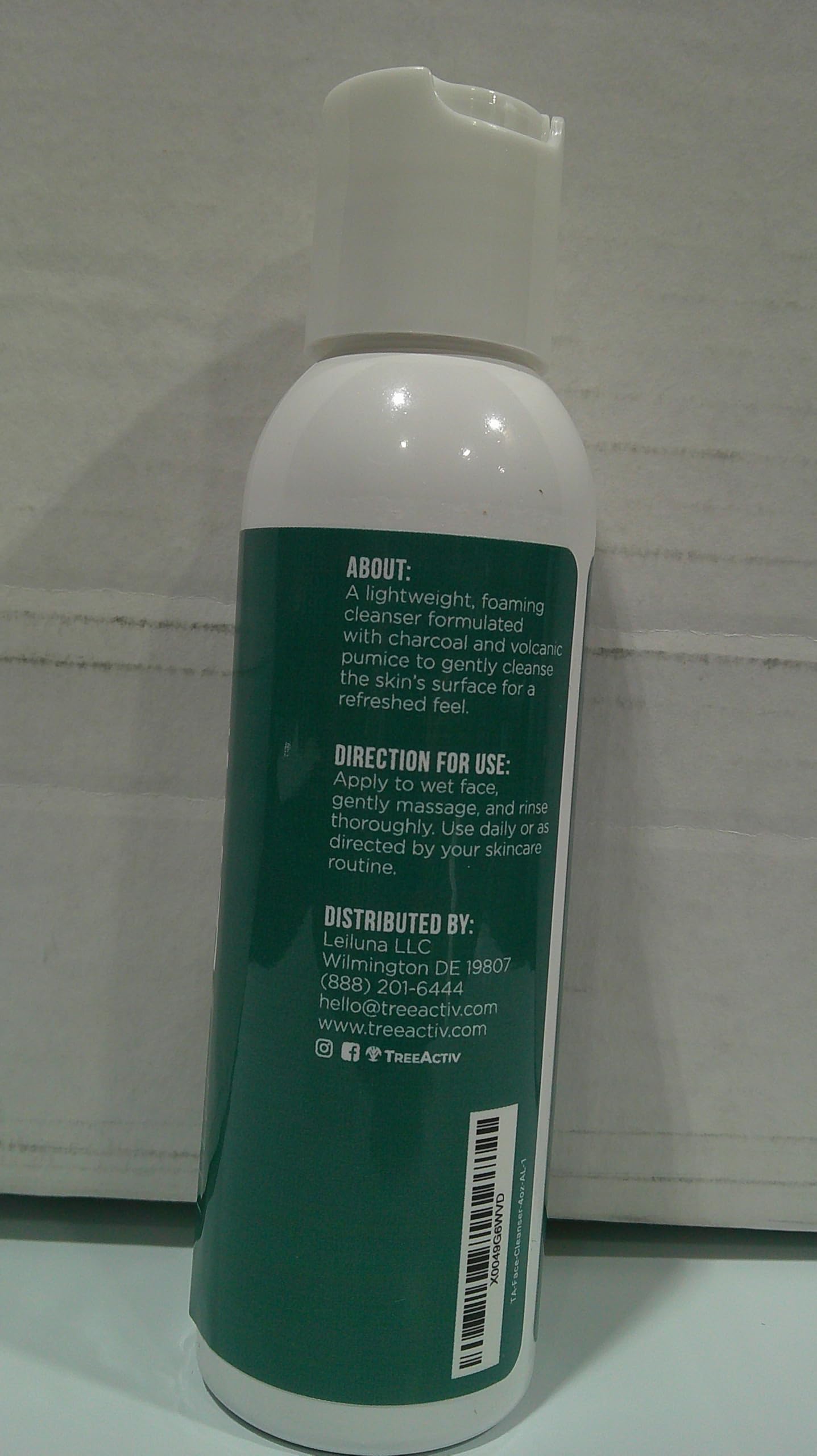 TreeActiv Charcoal Face Wash label highlights sulfur and honey ingredients