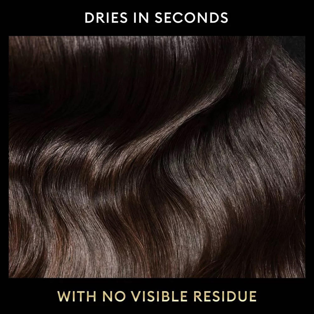 TRESemmé easy-to-use spray application from six inches away on dry hair.
