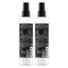 TRESemmé Keratin Repair Leave-In spray demonstrates even mist for styling.