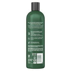 TRESemmé Pro Infusion Fluid Volume Conditioner label highlights Biotin boost for volume.