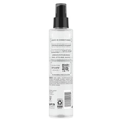 TRESemmé Pro Pure leave-in bottle front view for detangling and conditioning.