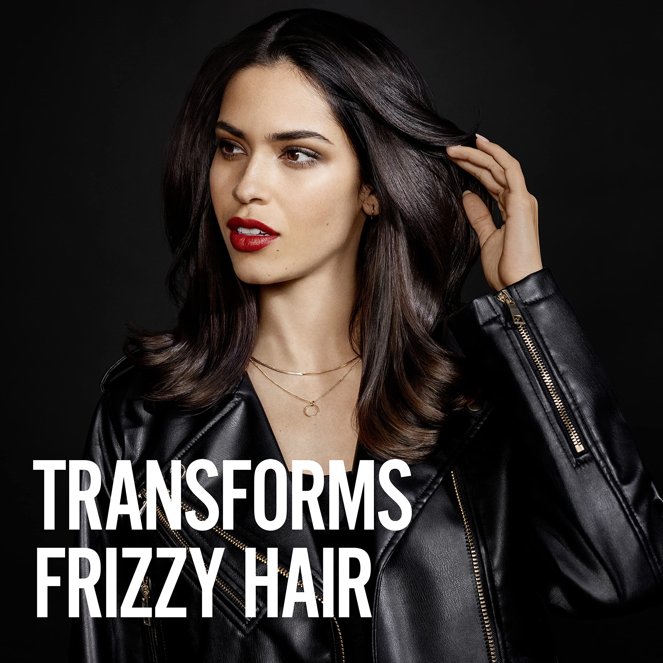 Conditioner applied evenly through wet hair for detangle