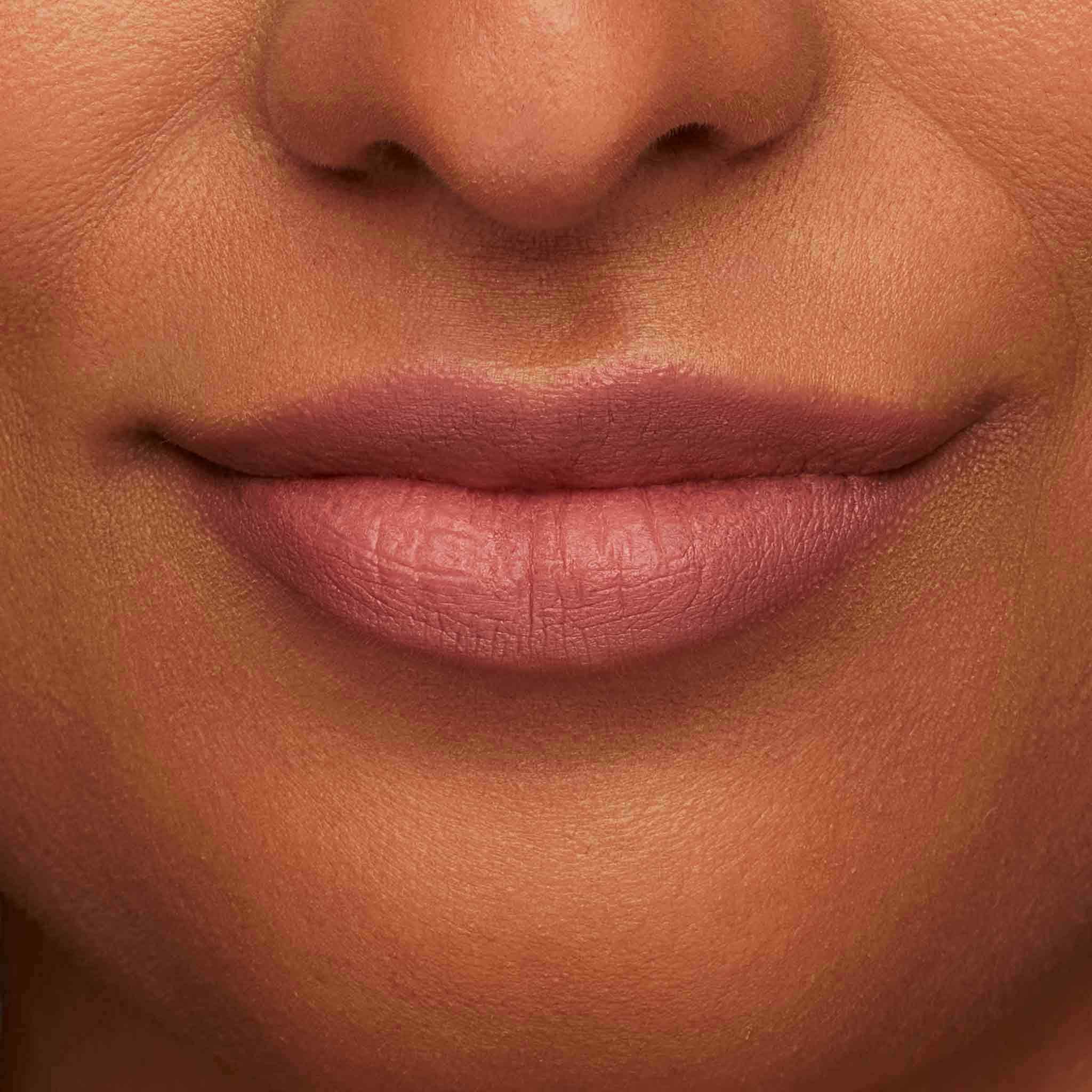 TRE'STIQUE built-in lip-balm in action adds subtle shine to the lip.