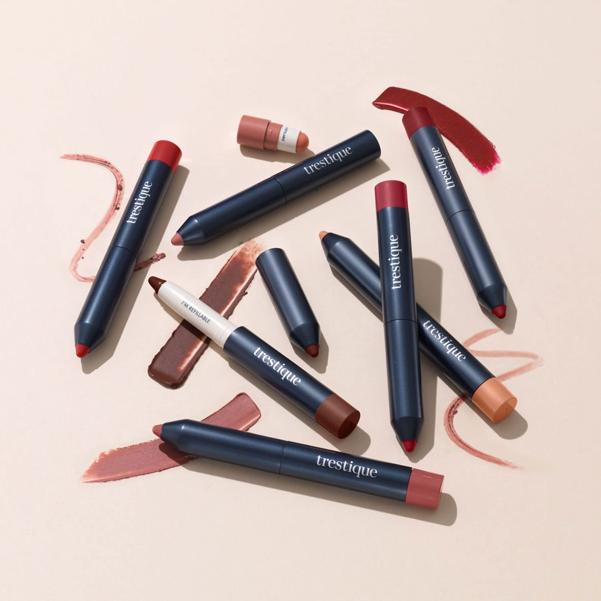 TRE'STIQUE Chile Red lip color with optional shine layer.