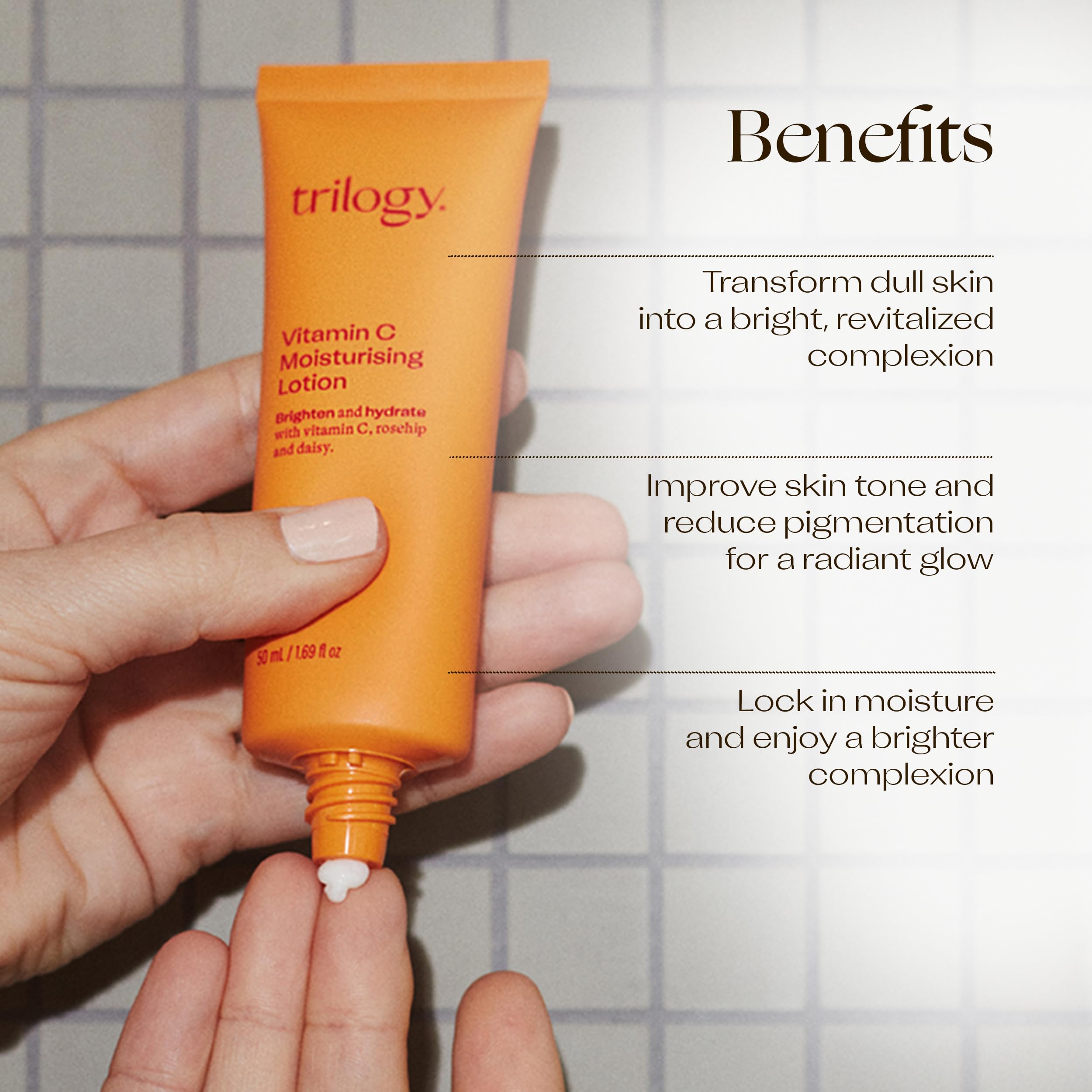 Applying Trilogy Vitamin C Moisturising Lotion for makeup-ready hydration.