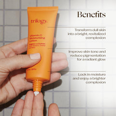 Applying Trilogy Vitamin C Moisturising Lotion for makeup-ready hydration.