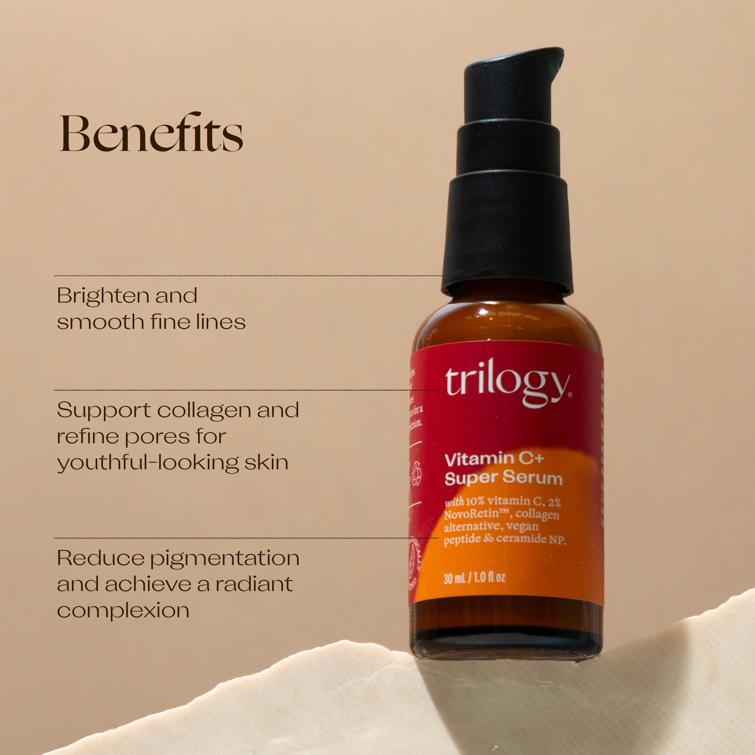 Trilogy Vitamin C Serum texture close-up showing silky finish.