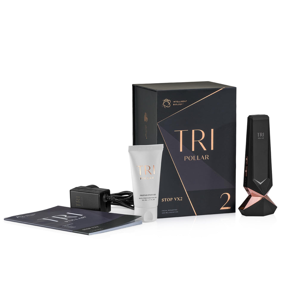TriPollar Stop Vx 2 in hand during a home facial session for targeted warmth.