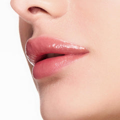 Trish McEvoy Beauty Booster lip gloss worn alone for natural nude glow