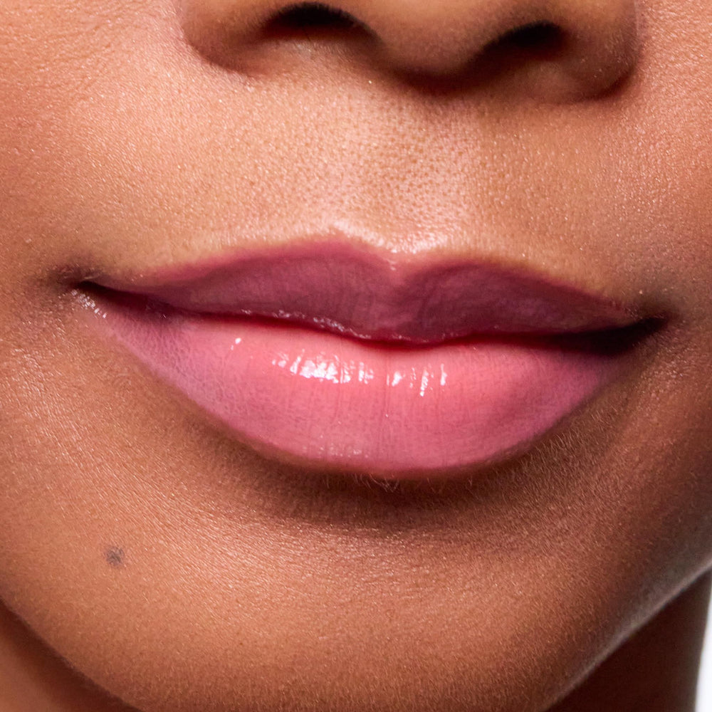 Trish McEvoy Easy Lip Gloss Lover provides lightweight hydration and fullness.