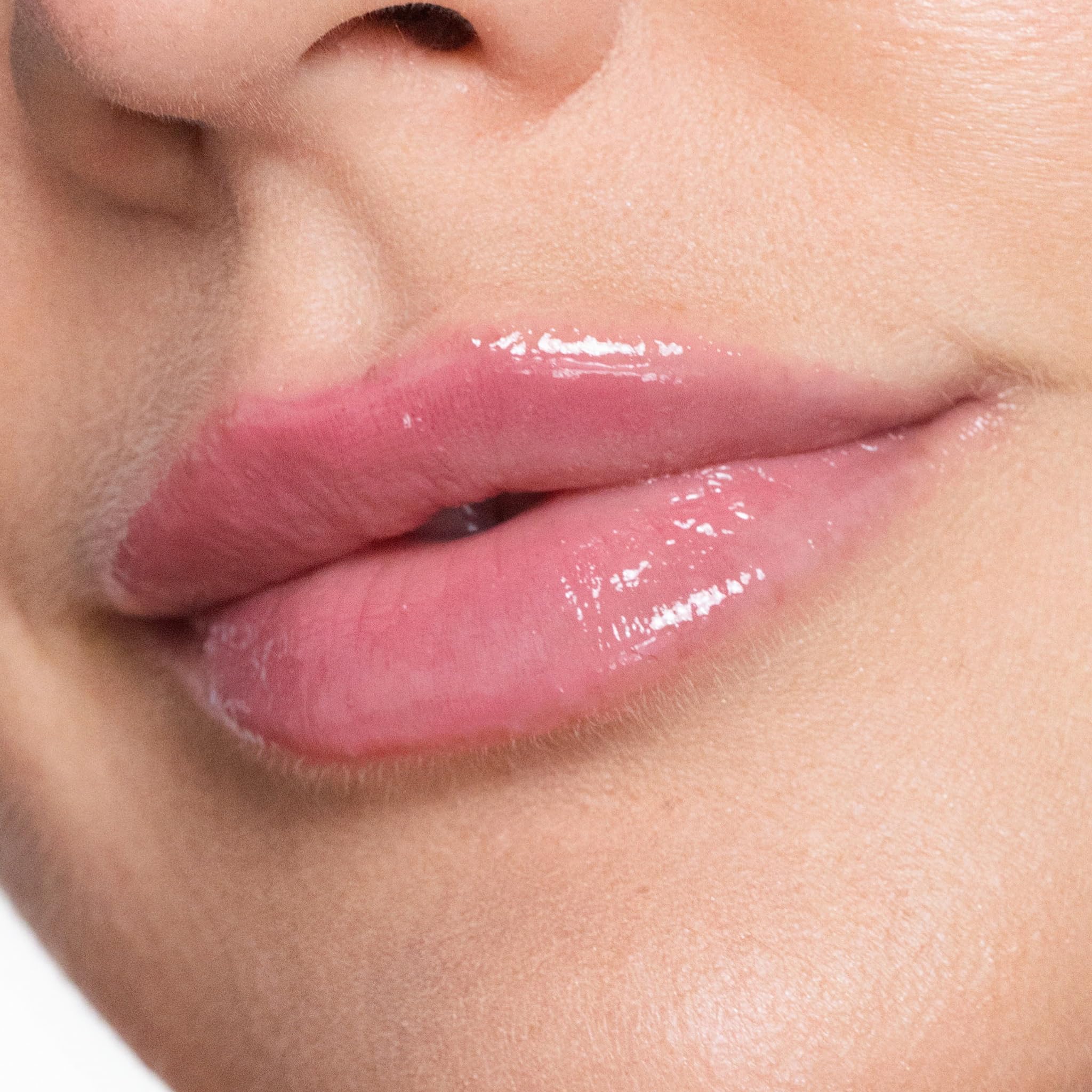Trish McEvoy Easy Lip Gloss Lover features peptides and oils for lips.