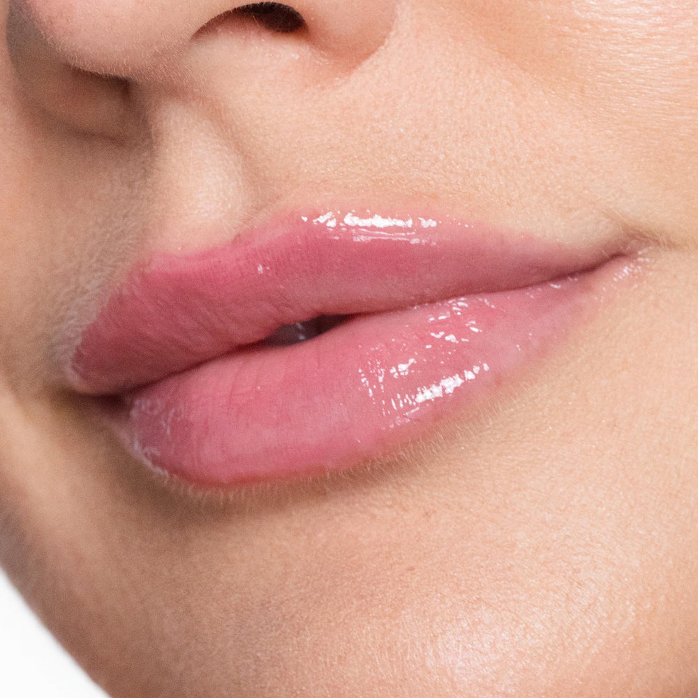 Trish McEvoy Easy Lip Gloss Lover features peptides and oils for lips.
