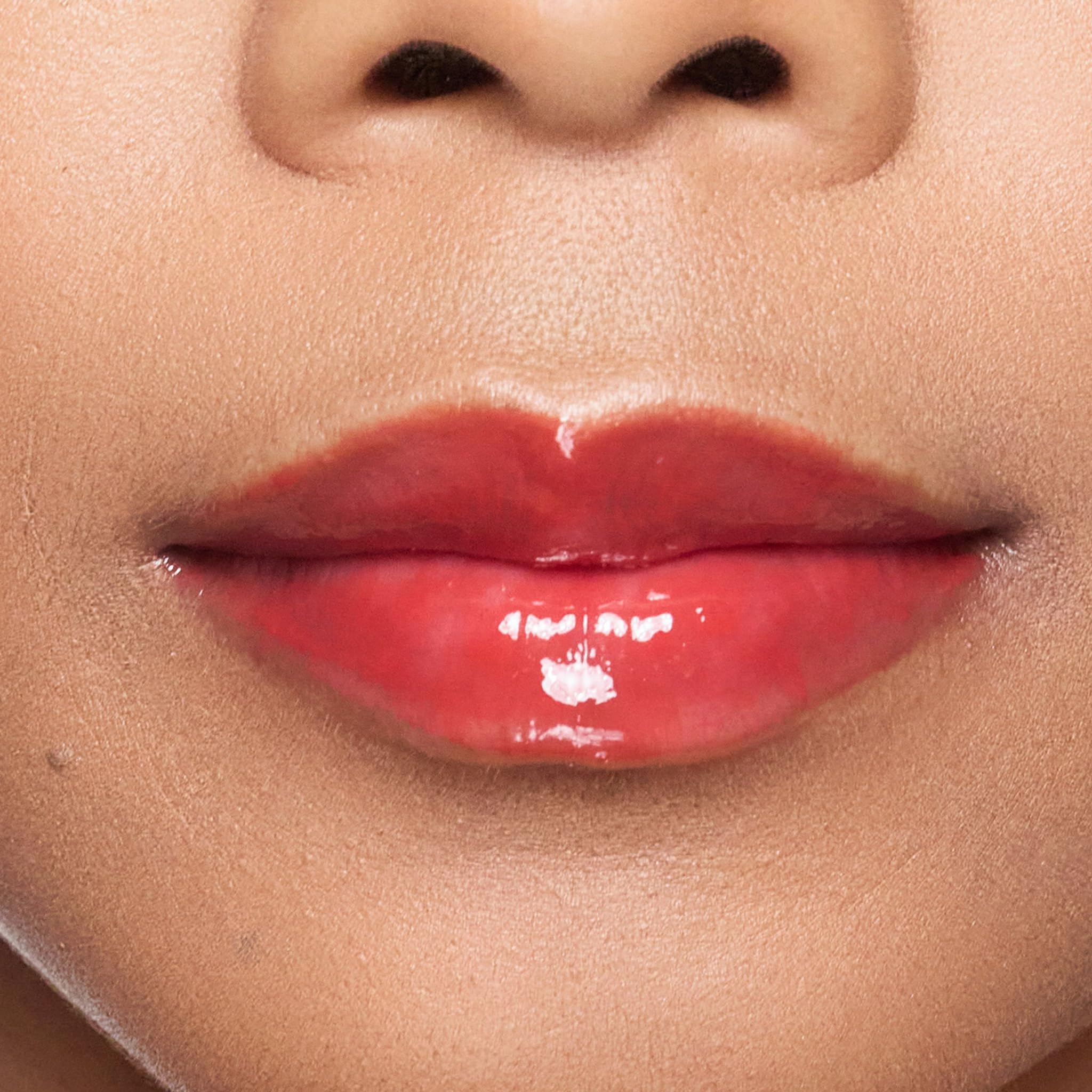 Close-up of Rendezvous gloss highlighting shine and smooth lip texture