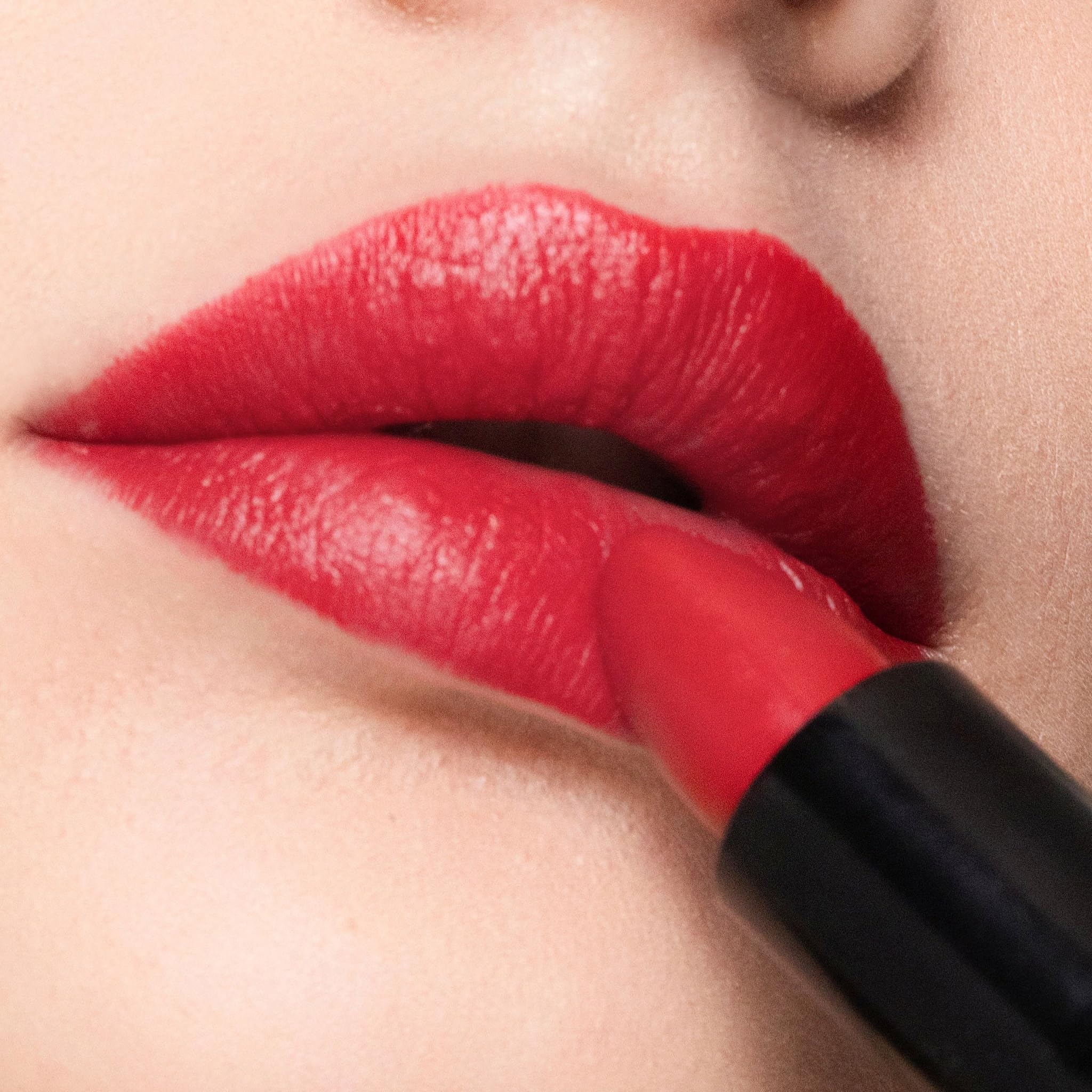Trish McEvoy Easy Lip Gloss Shade Vixen over lip color for added brightness