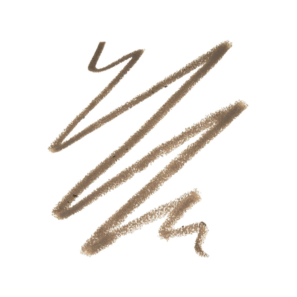 Trish McEvoy Precision Brow Shaper built-in brush for grooming and blending sparse areas.