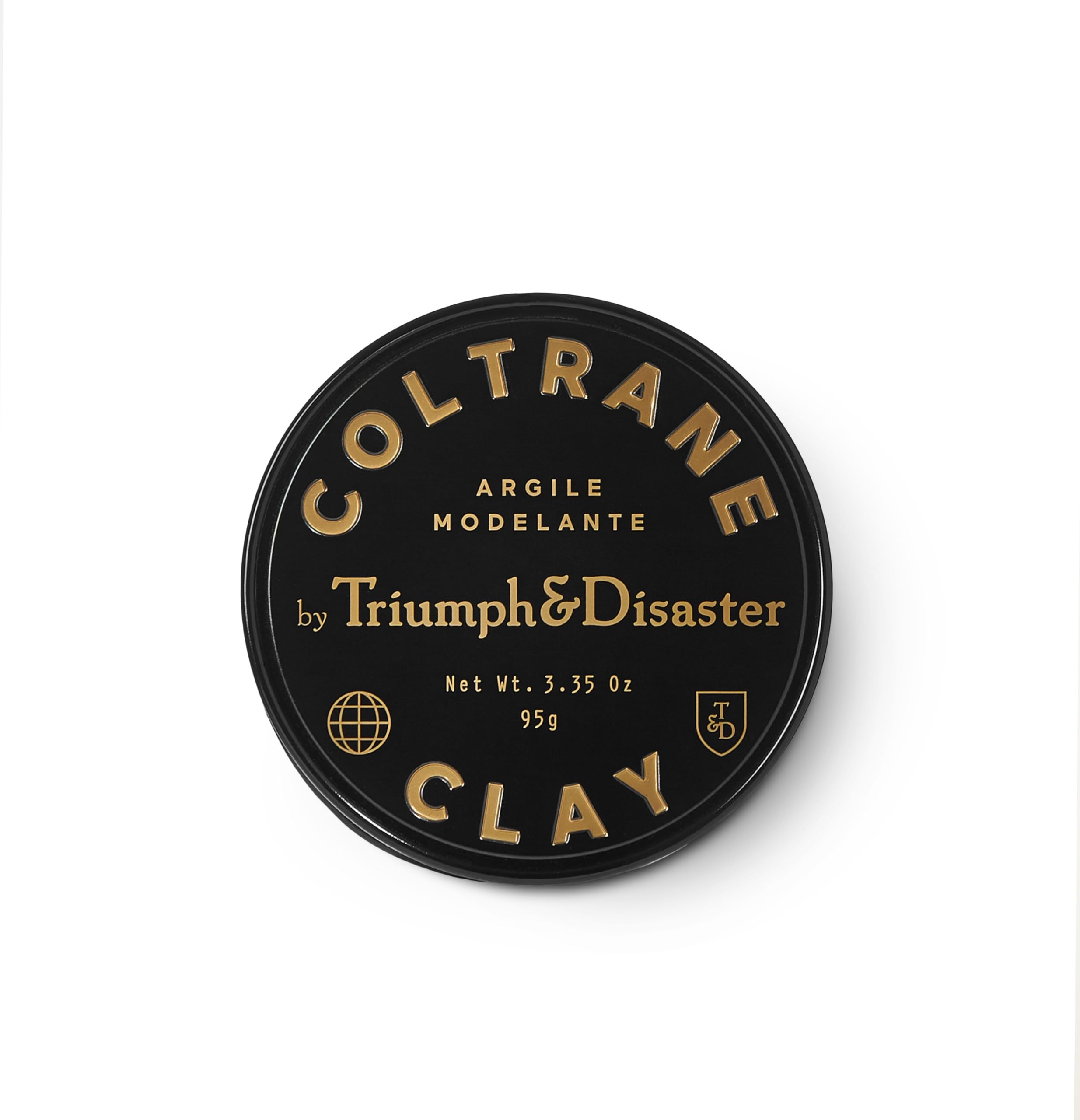 TRIUMPH & DISASTER Coltrane hair clay bottle close-up showing premium packaging and matte finish