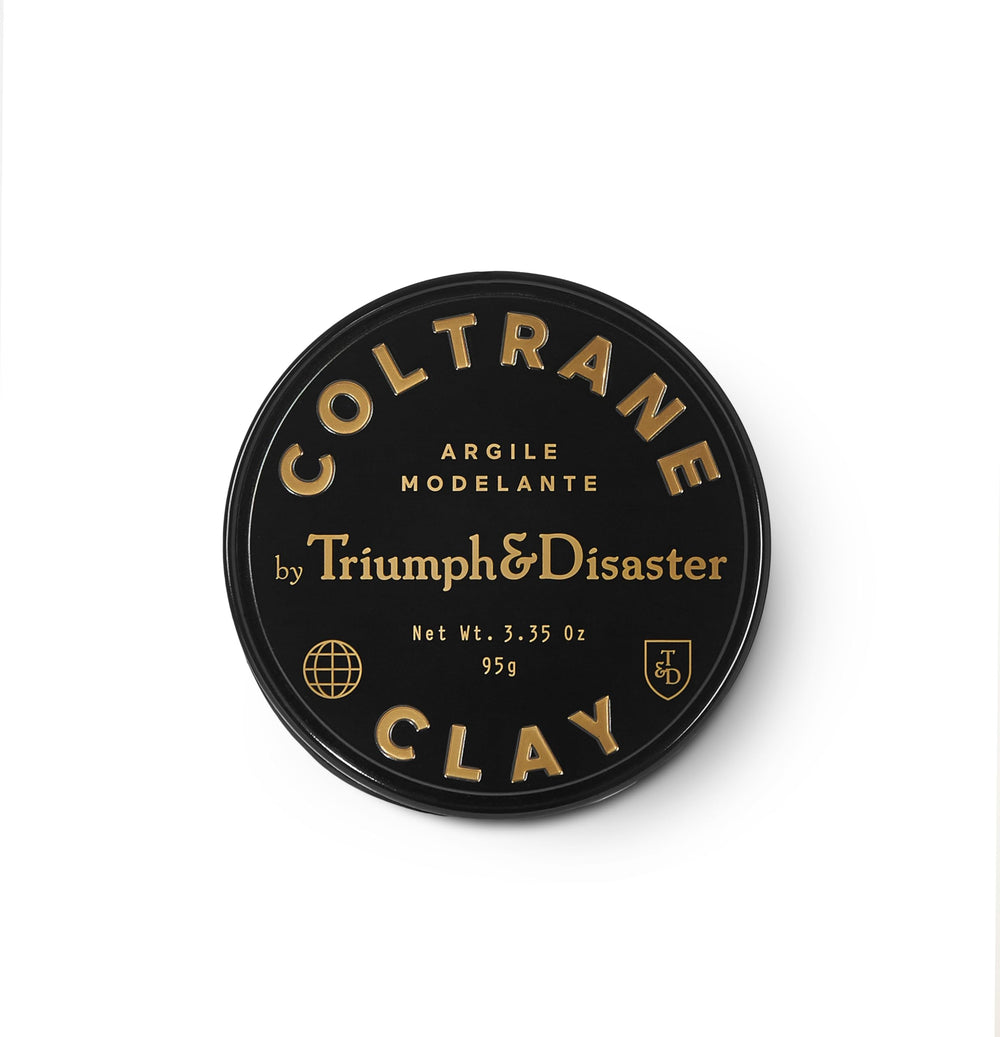 TRIUMPH & DISASTER Coltrane hair clay bottle close-up showing premium packaging and matte finish