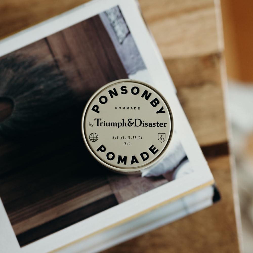 TRIUMPH & DISASTER Ponsonby Pomade on model with healthy gloss and styling flexibility.