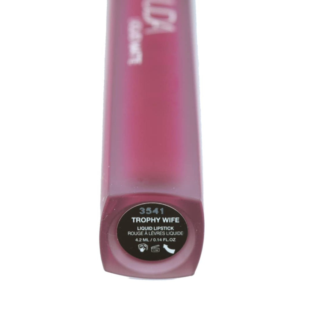 Trophy Wife swatch on lips shows rich rosewood color and long-wear potential