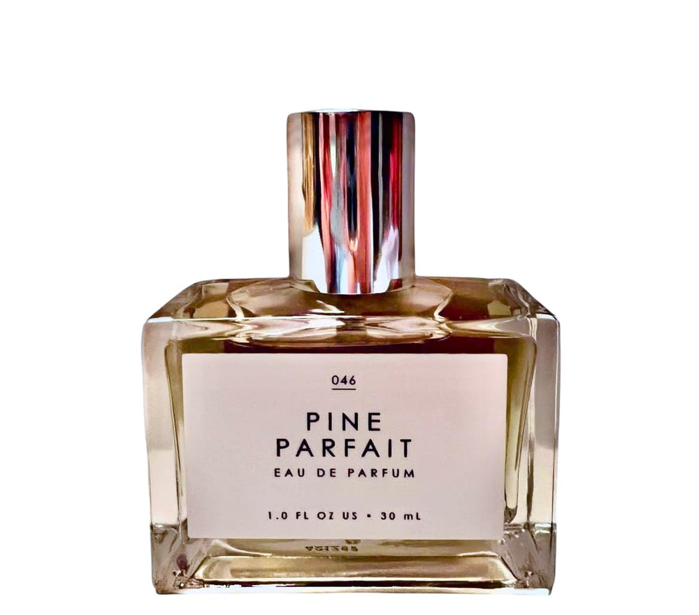 Tru Fragrance Le Monde Gourmand Pine Parfait bottle offers warmth for daily wear.