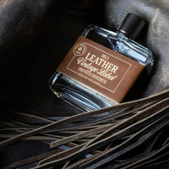 Tru Fragrance Beauty Leather No.1 Clementine glow accentuates citrus lift.
