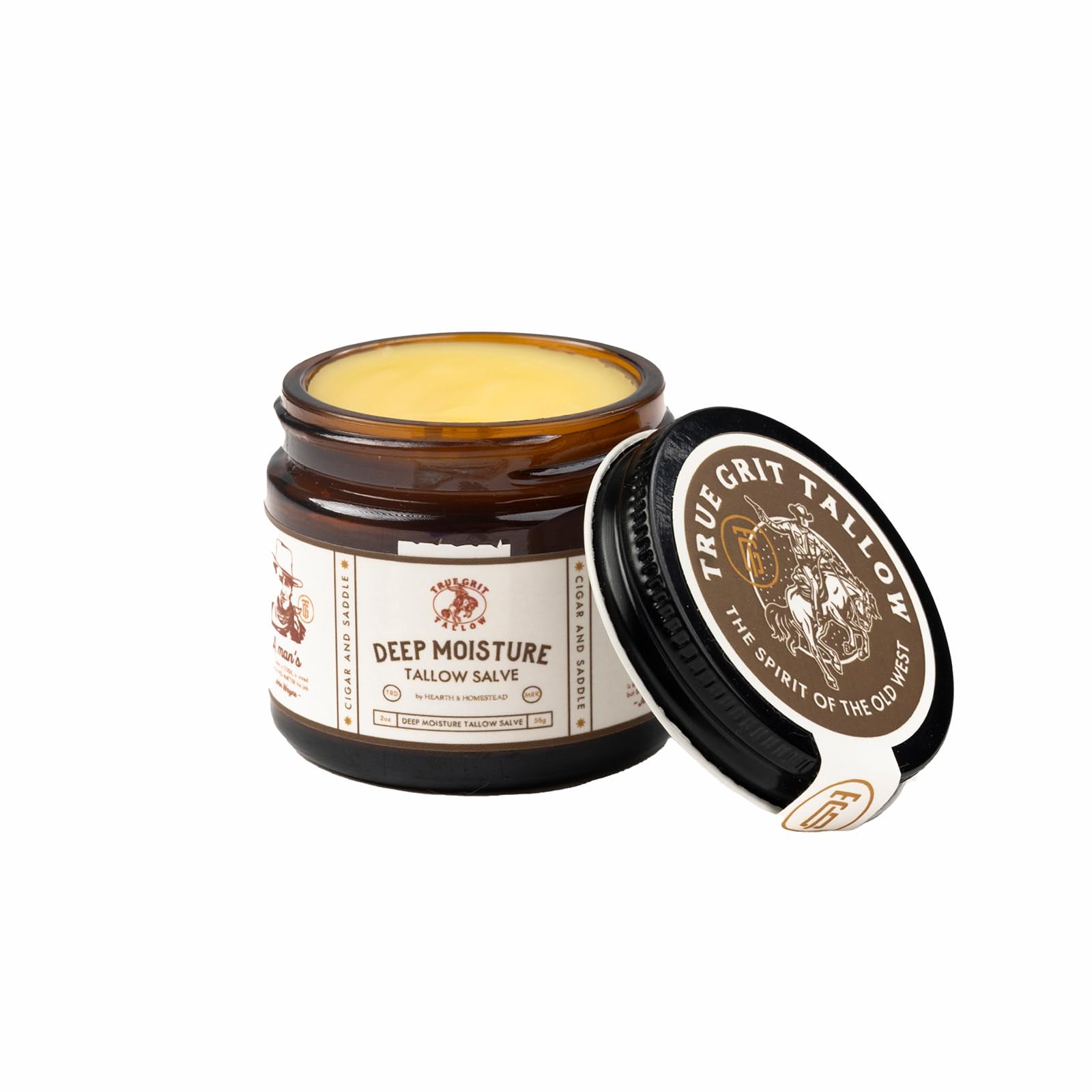 True Grit Tallow salve being applied on hands for dry skin