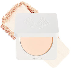 True Luscious Sheer Halo compact ivory close-up shows smooth powder texture for natural glow