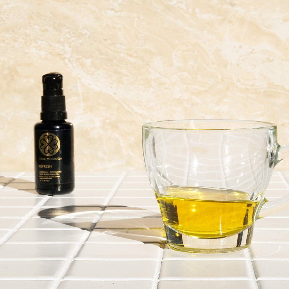 True Moringa Neroli oil box and bottle highlight a vegan, cruelty-free product.