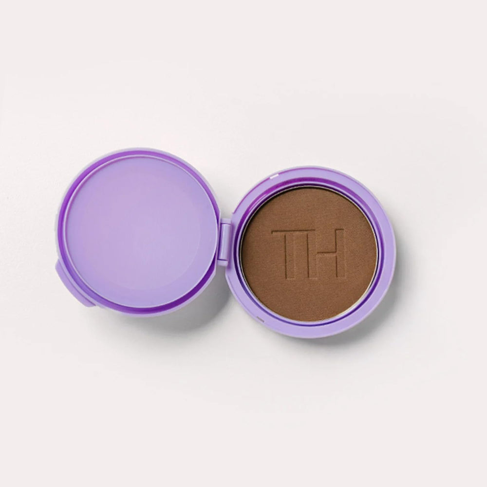 Truhair Root & Scalp Cover Up compact close-up showing weightless, natural-looking coverage